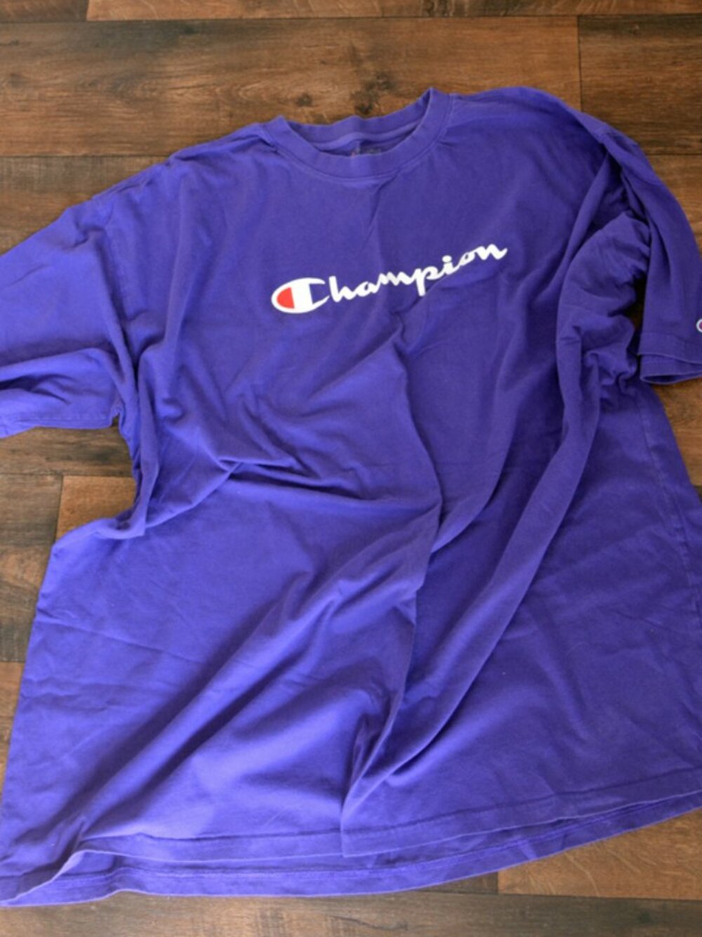 Champion Tee